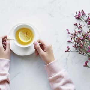 afternoon, beverage, break, clean, cup, cozy, decoration, tea cup, drink, drinking, enjoying, feminine, flatlay, floral, hands, holding, hot drink, lemon tea, lifestyle, morning, mug, refreshment, rejuvenate, relaxation, serene, simple, tea
