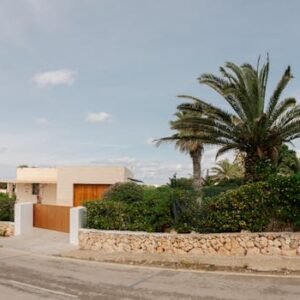 Contemporary villa surrounded by lush greenery in Ciutadella de Menorca, Balearic Islands.